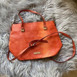 Christian Siriano orange purse
